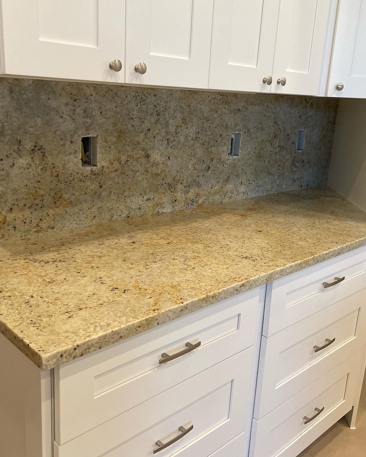 Colonial Gold granite with full-height backsplash